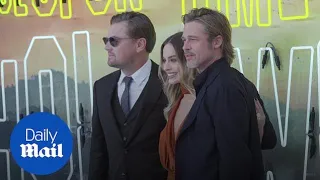 Margot Robbie, Leonardo DiCaprio and Brad Pitt on red carpet