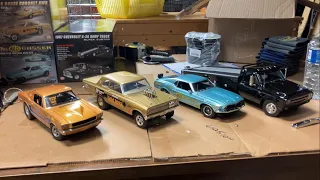 Opening various 1/18 scale ACME Trading Co. diecast collectible cars