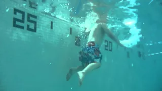 William retrieving his dive sticks from the bottom of the pool