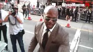 Terry Crews arrives to screaming fans at Expendables 2 premiere signs U.S Army Poster