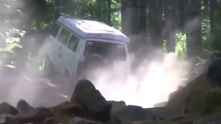 VW Vanagon Syncro, Westfalia camper, vs Land Rover Defender, rock crawling.