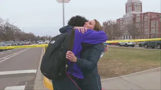 Reporter covering Denver school shooting reunited with student son in viral moment