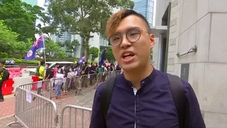 Hong Kong protesters march and sing in plea to Britain