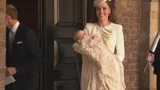 Prince George leaves christening at St James's palace in his mother's arms