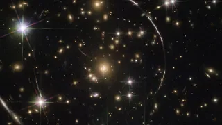 Hubble Captures Rare Kaleidoscope Image of Distant Sunburst Arc