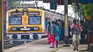Howrah to Barddhaman modern ICF EMU local trains arriving on a crowded platform