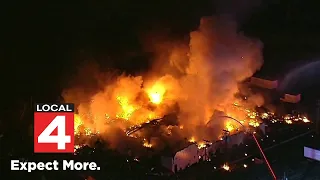 Macomb County fire: See aerial footage of flames burning at distribution plant