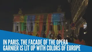In Paris, the façade of the Opera Garnier is lit up with colors of Europe