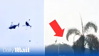 Helicopters collide mid-air in Malaysia during rehearsal for Navy parade