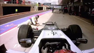 Kamui Kobayashi hits a mechanic British GP 2012