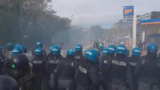 Police confront anti-Covid pass protesters in Italy | AFP