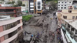 Rescue teams search for missing people after deadly mudslide in Ecuador