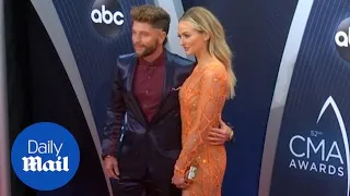 Lauren Bushnell and new boyfriend Chris Lane wow on red carpet