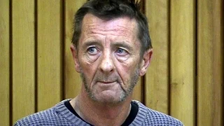 AC/DC drummer Phil Rudd charged with attempting to procure murder and possession of drugs