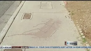 Swastika on sidewalk