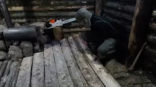 hiding in a huge dugout during a snow storm, spending the night in  bushcraft shelter * 17