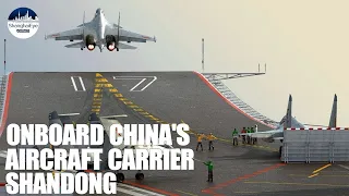 Onboard China's first home-built aircraft carrier Shandong