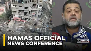 Hamas official giving news conference on latest attacks in Gaza