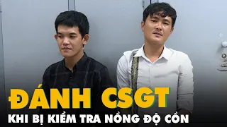 Bị kiểm tra nồng độ cồn, 2 anh em đánh cảnh sát giao thông