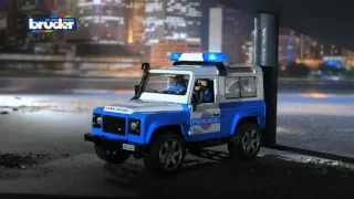 Bruder Toys Land Rover Police Vehicle with Light Skin Policeman #02595