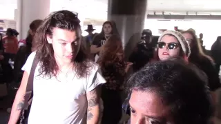 Harry Styles Arrives At LAX Airport In Los Angeles