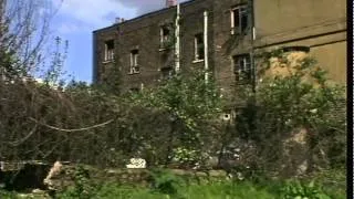 CAMDEN - WASTELAND. APRIL 1988.  SL.144 - 1.  GVS. SHOPS DERELICT.  KENTISH TOWN RD.  WASTELAND & B