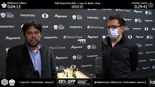 Hikaru Nakamura and Levon Aronian after a draw in the first game of the FIDE Grand Prix 2022 Final