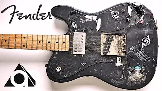-I refretted and cleaned up a worn and battered guitar.-