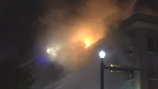 Firefighters continue to battle the Beaumont downtown building two-alarm fire