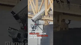 Semi driver rescued from truck dangling off Louisville bridge over Ohio River