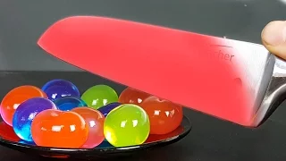 EXPERIMENT Glowing 1000 degree KNIFE VS ORBEEZ BALLS