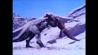 Big Trex Finds and Eats a Small Rhedosaurus