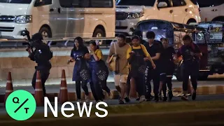 Thai Police Rush People Out of Mall Where Gunman Killed 27 and Injured 57