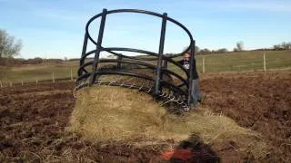 How to get a round bale into a hay net