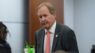 Texas Attorney General Ken Paxton reacts after deal reached in securities fraud case
