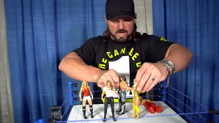 AJ Styles checks out Ronda Rousey's first WWE action figure