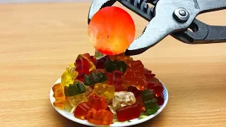 EXPERIMENT Glowing 1000 degree METAL BALL vs Haribo!