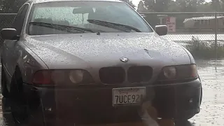 540i BMW in the rain