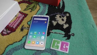 Xiaomi Redmi 5 Plus обзор на фоне Xiaomi Redmi Note 5A