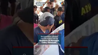 Migrantes parten piñatas de dictadores en Chiapas en respuesta a la Cumbre sobre Migración.