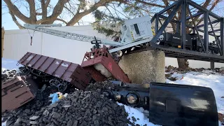 STEAM TRAIN CRASHES OFF BRIDGE