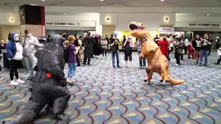 KamiCon Godzilla vs. T Rex fight.