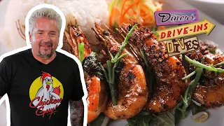 Guy Fieri Eats Garlic Kauai Shrimp | Diners, Drive-Ins and Dives | Food Network