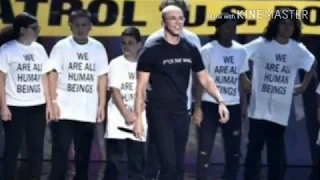 Logic stages immigrant protest at VMAs with parents, kids