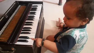 Play Harmonium by little (1year old baby) achchu 3 May 2021