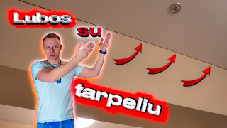 Lubos su tarpeliu!