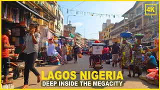 In the belly of Africa 's Most Populated City Lagos Nigeria - 4 K TRAVEL IMMERSION