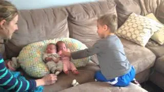Brother meets triplet siblings for the first time! 2 in the video, 3rd came home two days later.