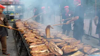 Italy street Food. Raclette Melted Cheese, Huge Grill of Juicy Ribs and more Food from Europe