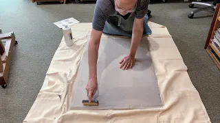 Mounting linen to a panel and applying an oil painting ground